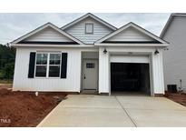 Charming one-story home with white siding, black shutters, and an attached one car garage at 250 Bluejay St, Clayton, NC 27520