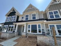 New construction townhome featuring modern architectural design and beautiful curb appeal at 3022 White Rail Dr, Fuquay Varina, NC 27526