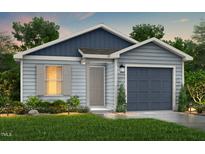 Charming single-Gathering home featuring blue vinyl siding, a covered entryway, and an attached garage at 123 Landon Pl, Roxboro, NC 27573
