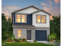 Charming two-story home with a front-entry garage and stylish siding at 213 Landon Pl, Roxboro, NC 27573