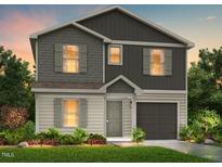 Charming two-story home featuring gray vinyl siding, shutters, landscaped yard, and a one-car garage at 249 Landon Pl, Roxboro, NC 27573