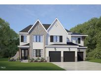 Charming two-story home features a three-car garage and classic black window shutters at 1217 Azalea Garden Cir, Raleigh, NC 27603