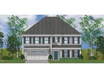 Charming two-story home with a grey exterior, dark shutters, and a well-manicured front lawn at 30 New Liberty Dr, Youngsville, NC 27596