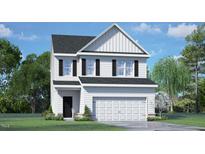 Charming two-story home with a gray roof, white siding, a two-car garage and a green lawn at 112 Global Ave, Fuquay Varina, NC 27526