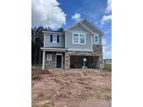 New two story home with stone accents, gray siding, and an attached two-car garage at 1003 Shovelhead Dr # 2, Durham, NC 27703