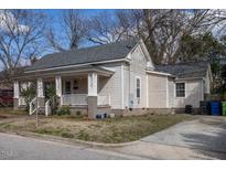 Charming single-story home with a cozy front porch and well-maintained yard at 305 Freeman St, Raleigh, NC 27601