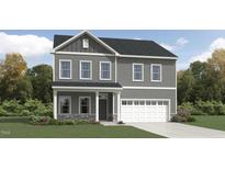 Charming two-story home featuring gray siding, stone accents, and a two-car garage at 1012 Red Roses Ave, Durham, NC 27703