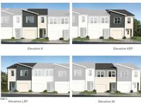 Charming modern townhome showcasing a gray, white, and black exterior at 1114 Merlot Hills Ln, Durham, NC 27704