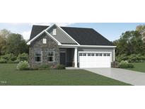Charming new construction home with stone facade and attached two car garage at 1400 Red Roses Ave, Durham, NC 27703