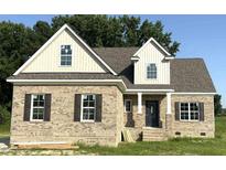 New construction featuring a brick facade, gabled roof, and stylish black front door at 1611 S Old Carriage Rd, Rocky Mount, NC 27804