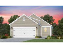 Attached garage with white door on a charming single Gathering home at 2328 Beeblossom Pl, Fuquay Varina, NC 27526