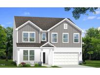 Charming two-story home featuring a modern design with a gray and white color scheme and a two-car garage at 788 Old Station Pointe, Angier, NC 27501