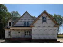 New home under construction with a brick foundation ready for siding and exterior finishes at 1589 S Old Carriage Rd, Rocky Mount, NC 27804