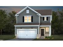 Charming two-story home with gray siding, white trim, a two-car garage, and a well-manicured front lawn at 629 Fosterton Cottage Way, Raleigh, NC 27603