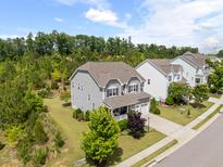 Beautiful two-story home with a well-maintained lawn and landscaping at 638 Boulder Point Dr, Chapel Hill, NC 27516