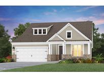 Charming one-story home featuring a brick-and-siding facade, a dormer window, and a landscaped front yard at 2433 Forsythia Trl, Fuquay Varina, NC 27526