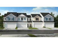 Charming townhomes featuring varied siding and individual garages, perfect for modern living at 518 Sunset Lake St, Durham, NC 27704