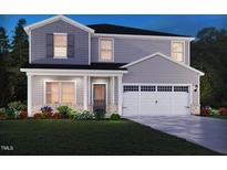 Charming two-story home with gray siding, a two-car garage, and a welcoming front porch at 641 White Birch Ln, Angier, NC 27501