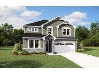 Charming two-story home with stone accents, attached two-car garage, manicured lawn, and craftsman details at 213 Sprenger St, Garner, NC 27529