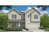 Charming two-story home with a two-car garage, complemented by lush landscaping and a welcoming entrance at 65 Cribbs Ln, Middlesex, NC 27557