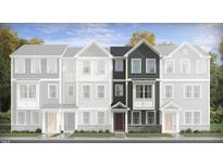 New construction townhome showcasing its modern architectural design and inviting entrance at 334 Carolina Springs Blvd, Apex, NC 27539