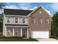 Charming two-story home featuring brick and siding accents, plus an attached two car garage at 223 Macon Lake Drive # 25, Apex, NC 27523