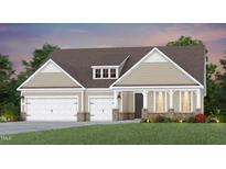 Charming single-Gathering home with a two-car garage, a front porch, and a well-manicured lawn at 2505 Del Webb Gardens Dr, Fuquay Varina, NC 27526