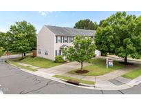 Charming townhome with well-maintained lawn, mature tree, and inviting curb appeal at 3508 Oneonta Ave, Raleigh, NC 27604