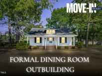 Charming one-story home with a welcoming front porch and mature trees in a serene setting at 310 Chicopee Rd, Benson, NC 27504