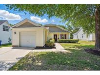 Charming single-story home featuring a well-manicured lawn and attached one-car garage at 3808 Hopper St, Raleigh, NC 27616