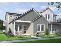 Charming craftsman-style home with a welcoming front porch and beautifully landscaped front yard at 2911 Alyssa Ct, Raleigh, NC 27604