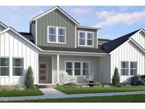 Charming two-story home featuring board and batten siding and a welcoming covered front porch at 2915 Alyssa Ct, Raleigh, NC 27604