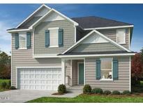 Charming two-story home with a two-car garage, gray siding, teal shutters, and well-maintained front yard at 936 Emmer St, Rolesville, NC 27571