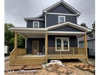 New construction with a covered front porch, offering a charming and inviting entryway at 618 Price Ave, Durham, NC 27701