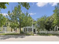 Charming two-story home with white picket fence, beautiful tree and well maintained yard at 815 Carpenter Town Ln, Cary, NC 27519