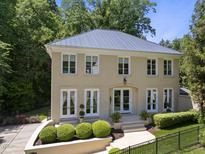 Elegant two-story home with manicured front yard and neutral stucco exterior at 3617 Carlow Ct, Raleigh, NC 27612