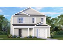 Charming two-story home with a classic design, well-manicured lawn, and attached garage at 5520 Musket Ct, Raleigh, NC 27610