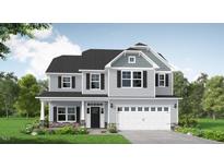 Charming two-story home with a two car garage, covered porch, gray siding, and black shutters at 246 Pretty Run Branch Ln, Wendell, NC 27591