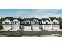 A row of new townhomes featuring varying neutral colors, modern garages, and well-maintained lawns at 108 Malbec Dr, Chapel Hill, NC 27516