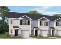 Charming townhome with black shutters and a one car garage at 517 Fife Ct, Gibsonville, NC 27249
