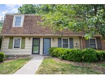 Charming townhouse with a well-maintained lawn and a neatly landscaped front entrance at 4822 Blue Bird Ct # B, Raleigh, NC 27606