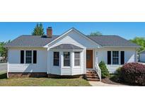 Charming house featuring a well-maintained front yard and inviting entrance at 500 Lemontree Ct, Graham, NC 27253