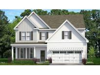 Charming two-story home with white siding, dark shutters, and a well-manicured lawn at 560 Lemon Daisy Ln, Knightdale, NC 27545