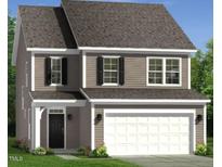 Charming two-story home features a two-car garage and classic curb appeal at 240 Steel Springs Ln # 50, Angier, NC 27501