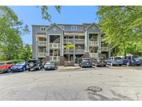 Attractive condominium building with ample parking and well-maintained landscaping at 700 Martin Luther King Jr Blvd # A6, Chapel Hill, NC 27514
