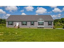 Charming one story home with gray siding, black shutters, and a well-maintained front yard at 2912 Epps Clark Rd, Siler City, NC 27344