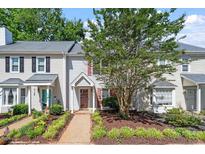 Charming townhome with manicured front yard and inviting entryway at 1442 Aversboro Rd # 7, Garner, NC 27529