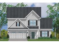 Charming two-story home featuring a two-car garage and classic architectural details at 186 N Maple Walk Dr # 224, Garner, NC 27529