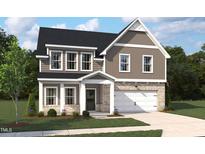 Charming two-story home with gray siding, white trim, a covered porch, and an attached two-car garage at 549 Contempo Ct # 6, Rolesville, NC 27571