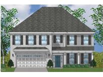 Two-story home featuring gray brick and siding, a gray shingled roof, and a two-car garage at 75 N Black Walnut Dr # 189, Garner, NC 27529